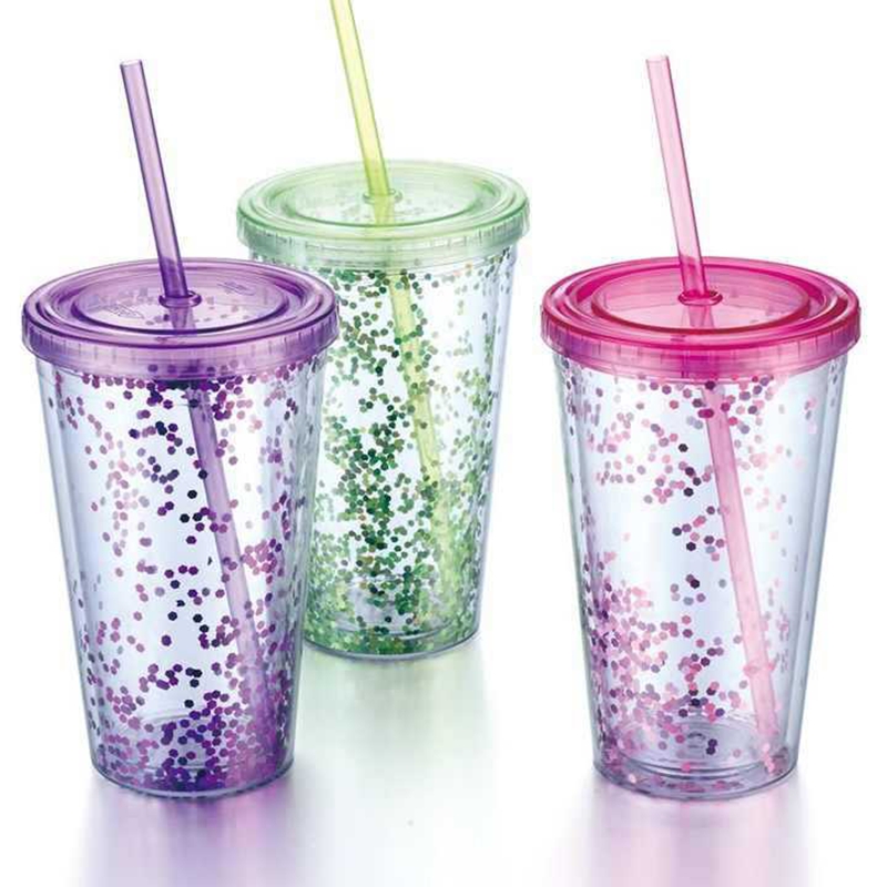 plastic cup with glitter and straw